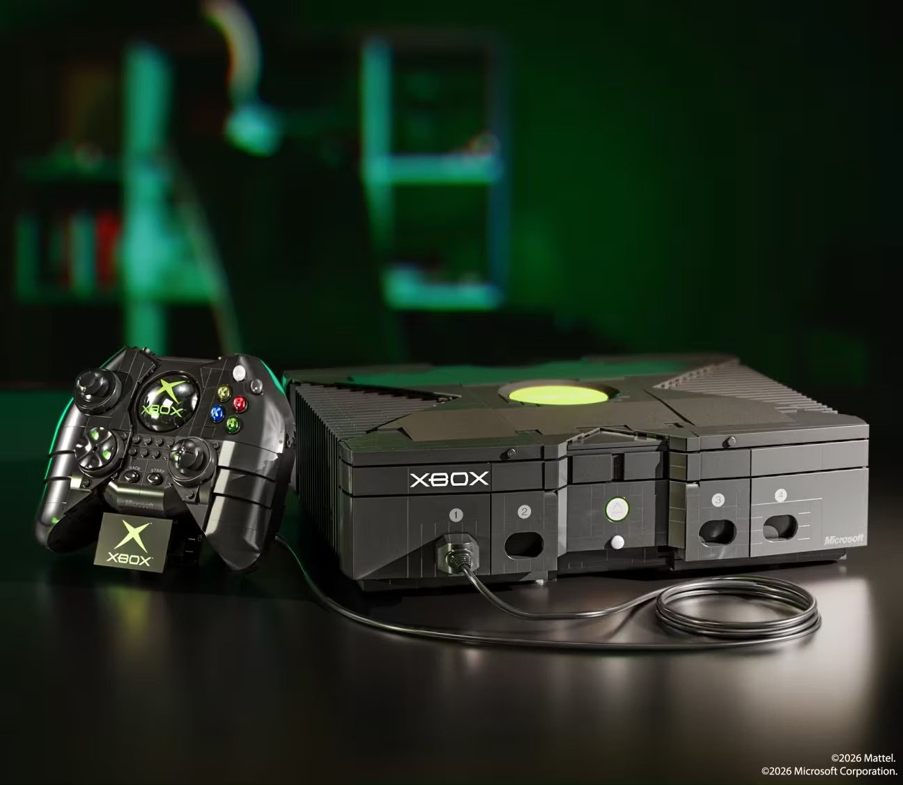 LEGO Xbox console set with controller and detailed black brick construction displayed on reflective surface.