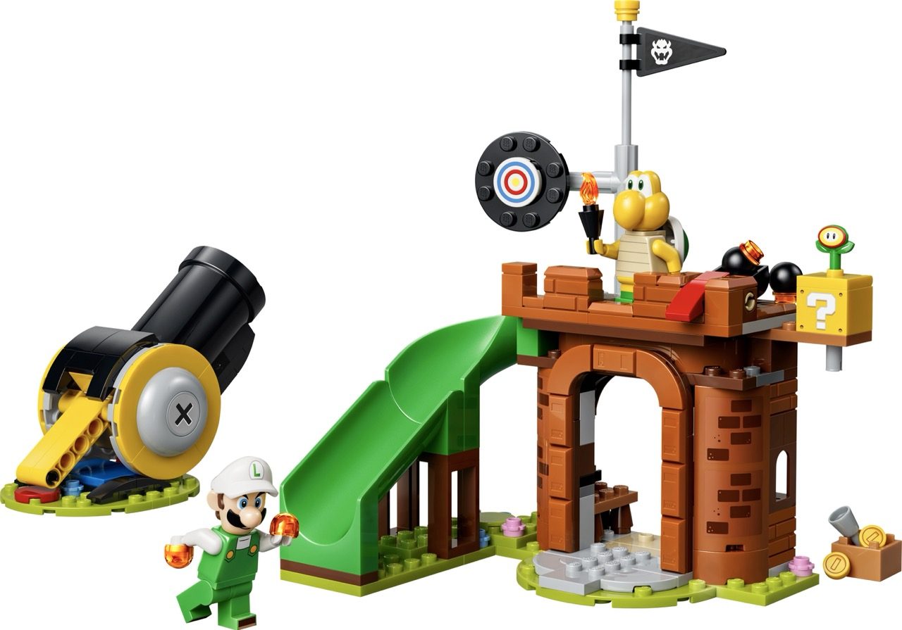 LEGO Super Mario set featuring Luigi minifigure, Bowser Jr., cannon, fortress tower with pirate flag, and green slide.
