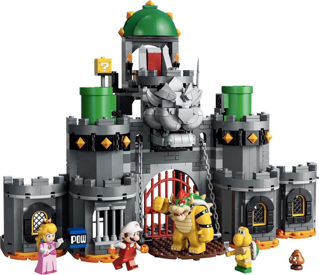 LEGO Super Mario Bowser's Castle set with gray stone towers, green dome roof, red gate, and minifigures including Peach an…