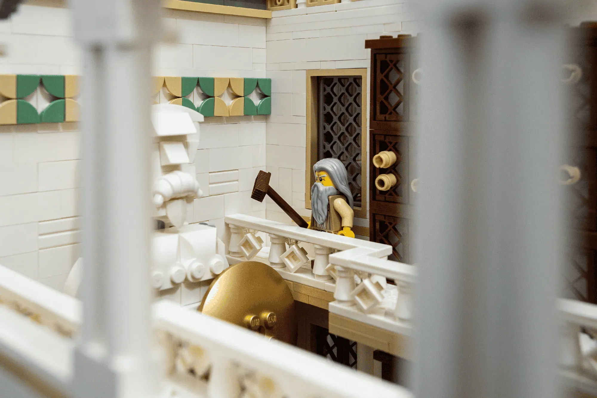 LEGO minifigure with axe in ancient library interior with white walls, decorative tiles, and gold dome details.