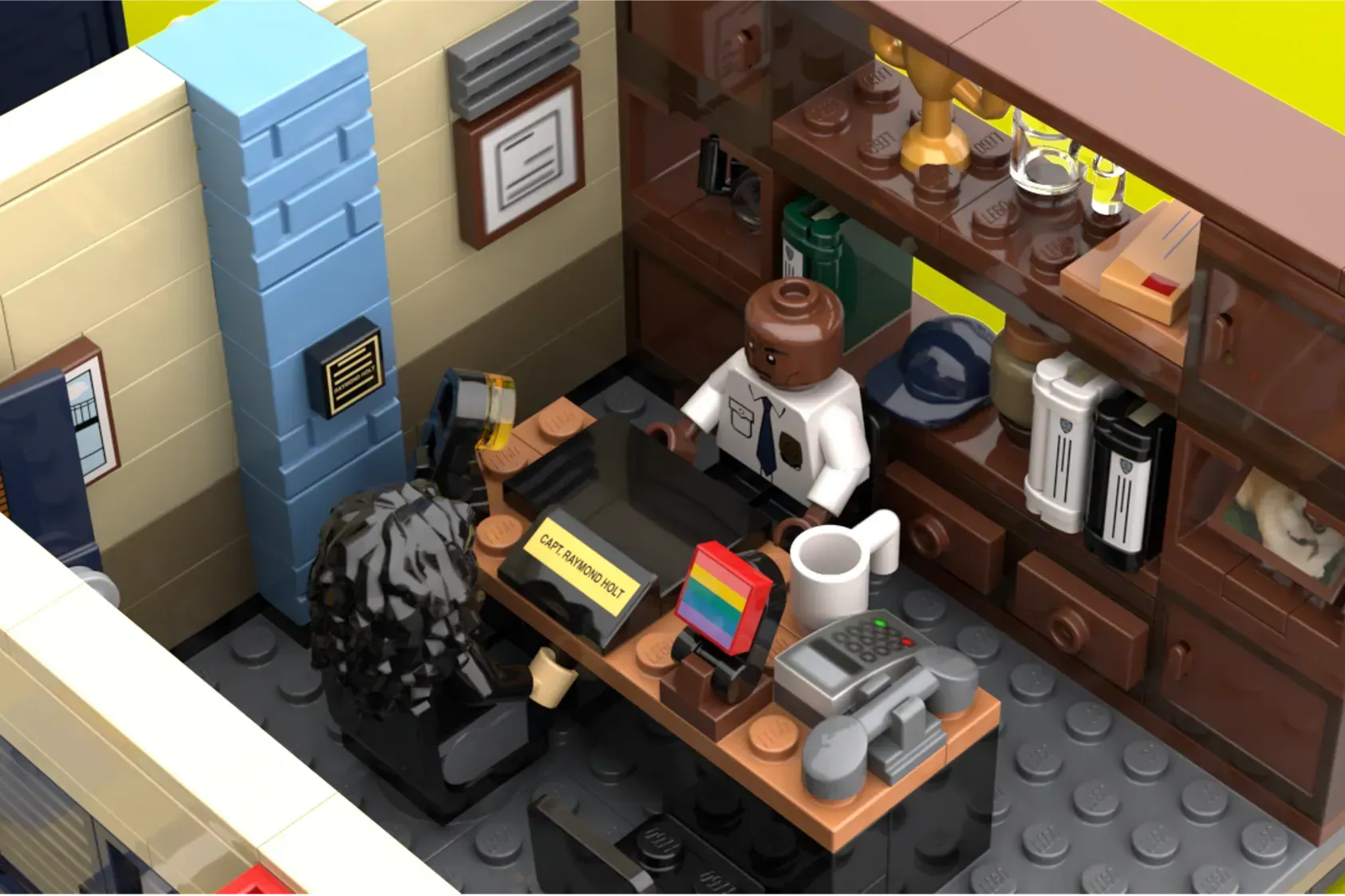 LEGO Brooklyn Nine-Nine precinct office with captain's desk, minifigure, and detailed furnishings.