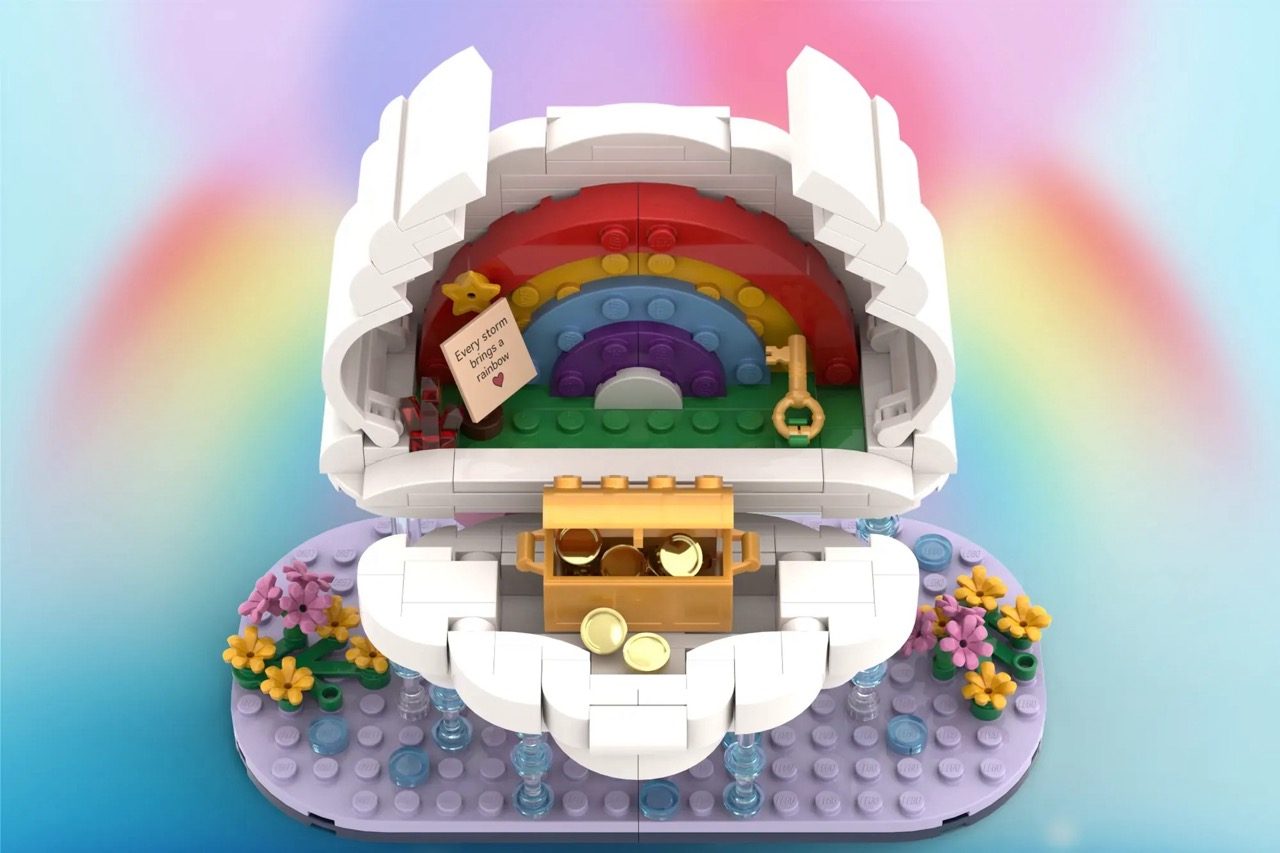 LEGO cloud-shaped set with opening doors revealing a rainbow interior, treasure chest, and flower garden base.