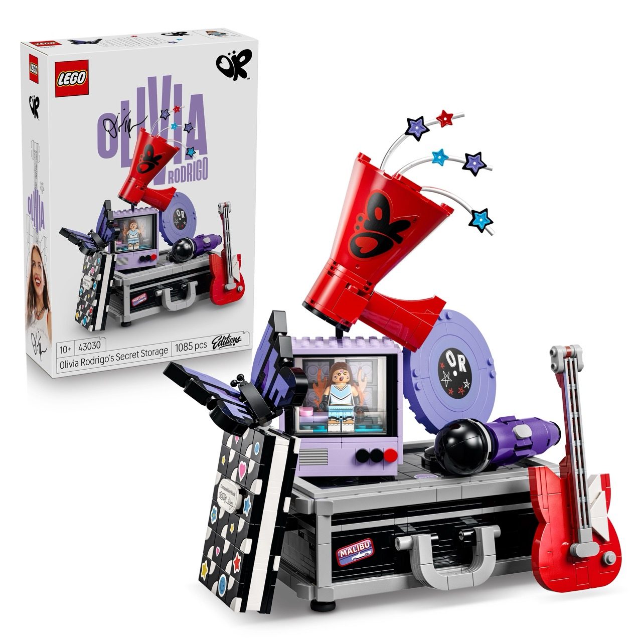 LEGO Olivia Rodrigo Secret Storage set with purple stage, red guitar, microphone, and minifigure.