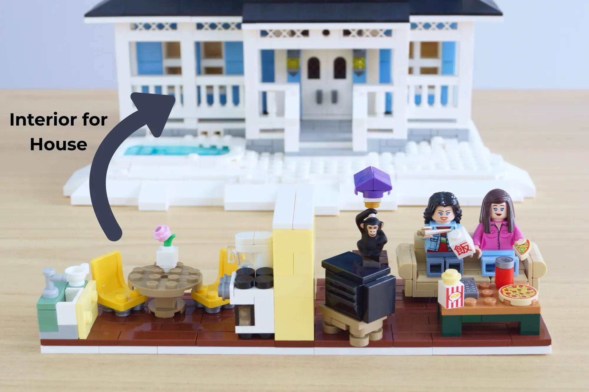 LEGO Gilmore Girls Stars Hollow set featuring Luke's Diner interior with minifigures and furniture details.