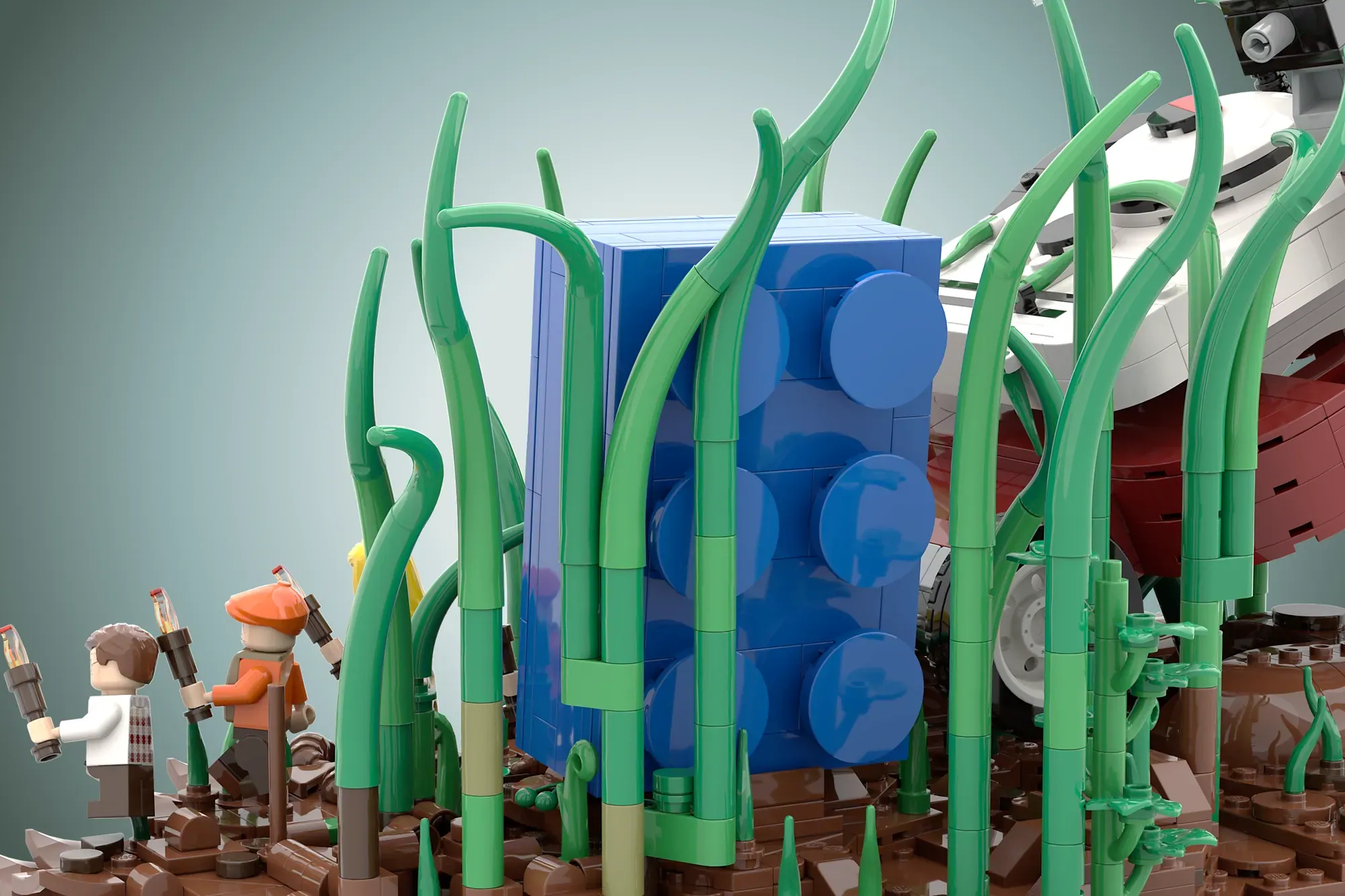 LEGO Ideas Honey I Shrunk the Kids set featuring giant green grass blades surrounding a blue structure with minifigures.