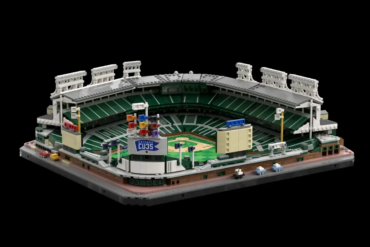 LEGO Ideas Wrigley Field set with green field, white upper deck, Chicago Cubs signage, and stadium details.