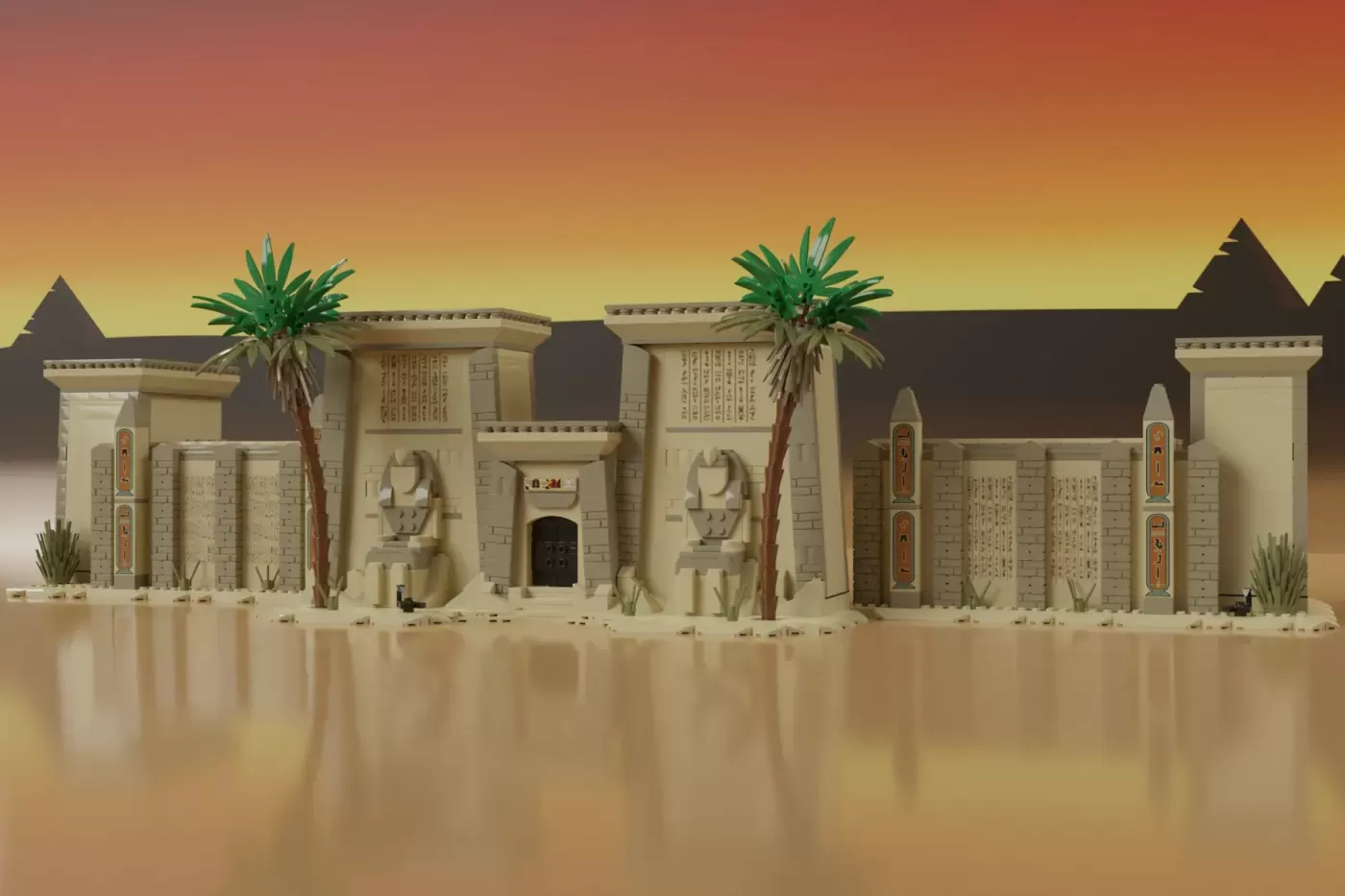 Large Egyptian temple LEGO set with palm trees, hieroglyphics, sphinx statues, and desert landscape backdrop.