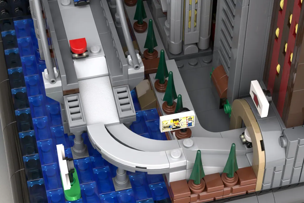 LEGO City street scene with curved white building, blue baseplate, green trees, brown landscaping, and red button element.