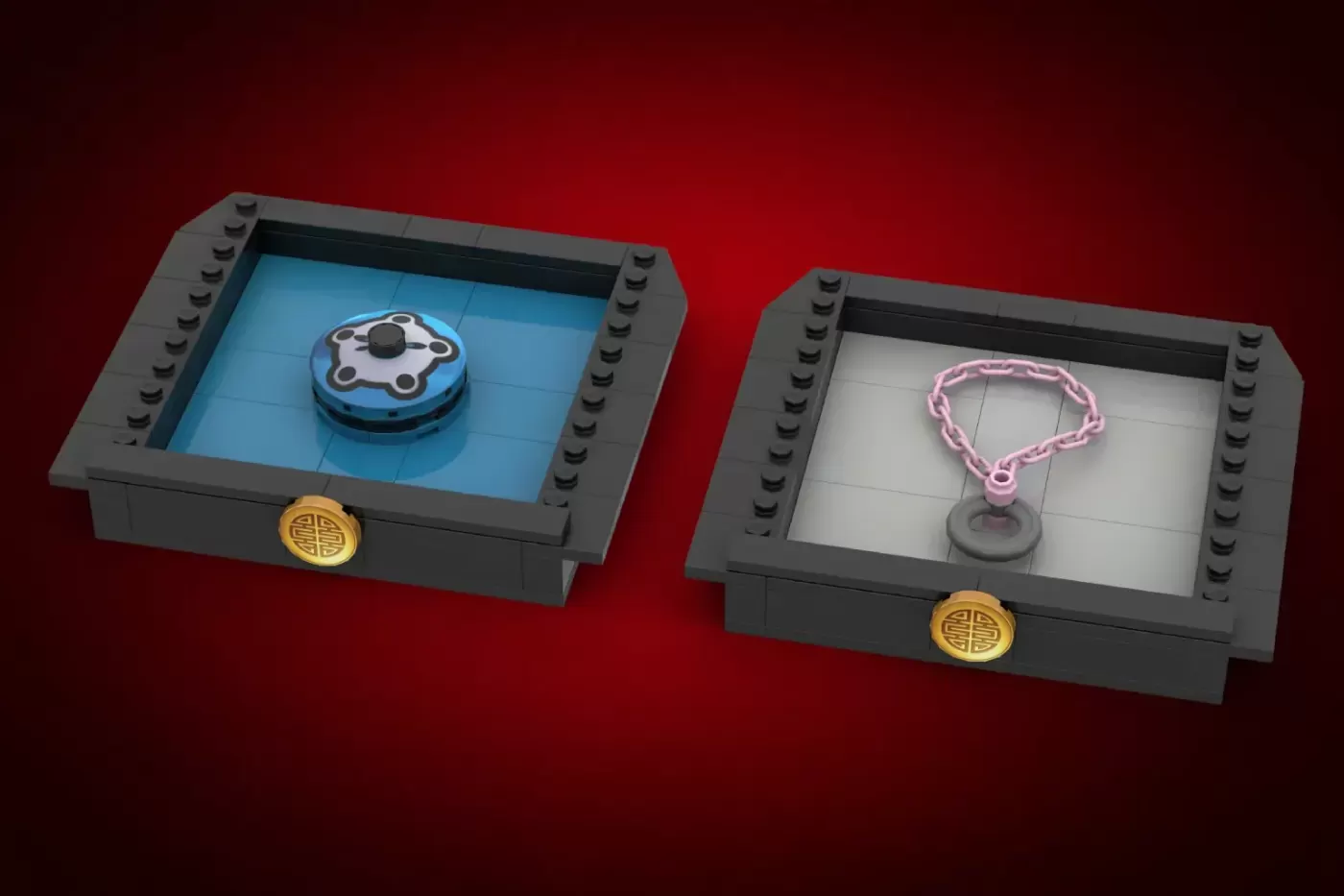 Two black LEGO display boxes with golden emblems containing blue magical disk and pink chain bracelet props.