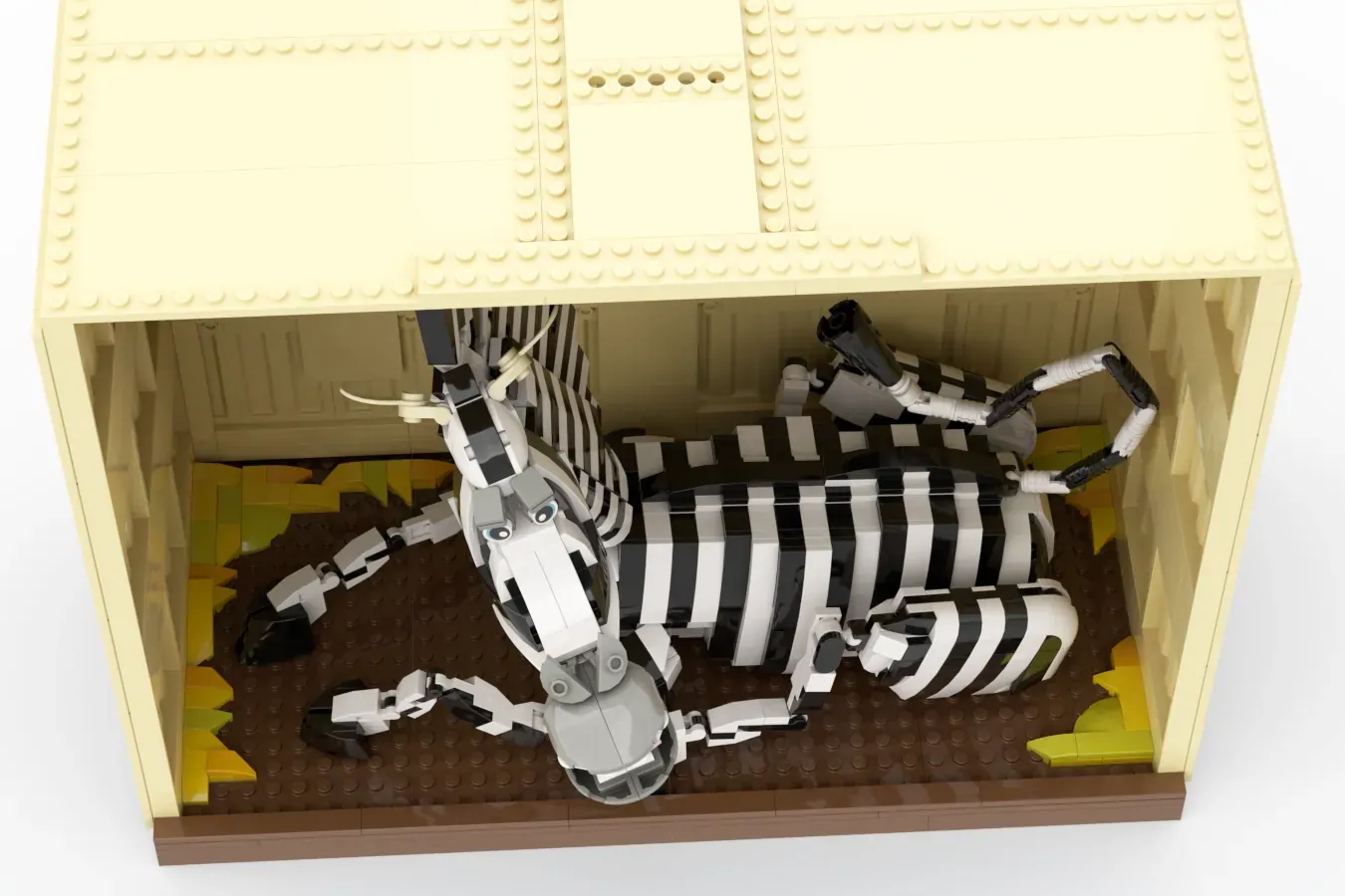 LEGO zebra figure with articulated striped body and poseable limbs displayed in cream-colored box set.