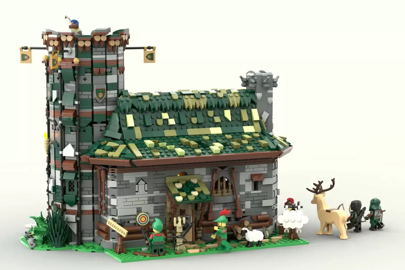 LEGO Medieval Hunter's Hut with tower, green tiled roof, minifigures, deer, and sheep on display.