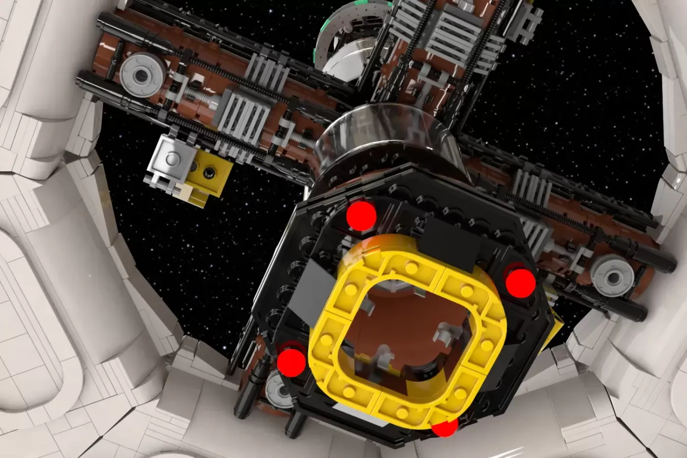 LEGO space station interior view showing rotating gravity ring with yellow airlock door and red lights docking mechanism.