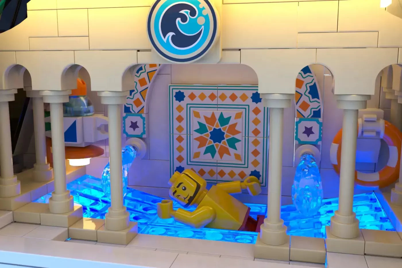 LEGO Grand Celestial Hotel pool area with rotating water feature, columns, and yellow minifigure.