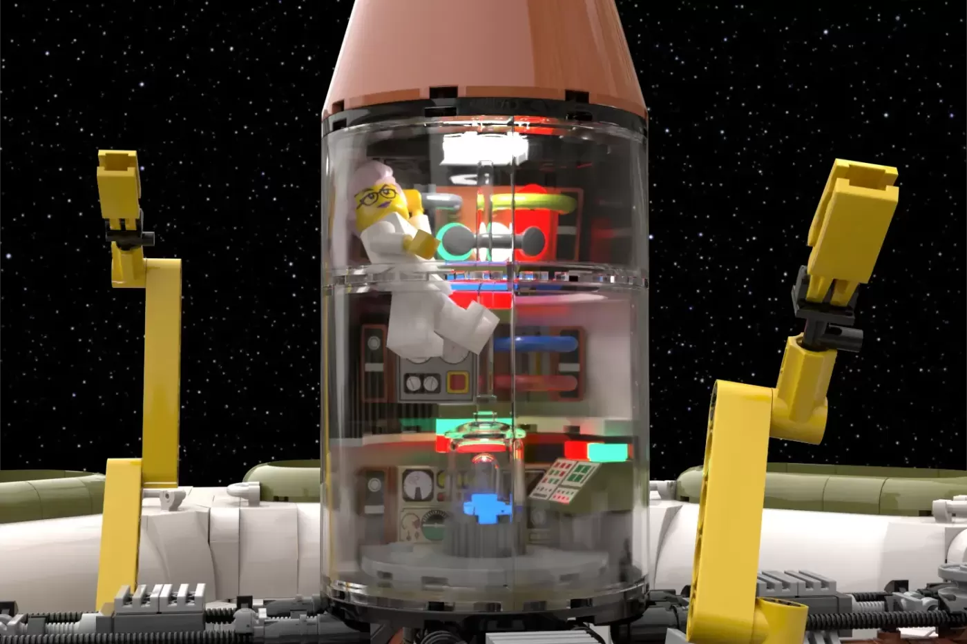 LEGO space station with rotating gravity ring, yellow robotic arms, and transparent cylindrical module with minifigure ins…