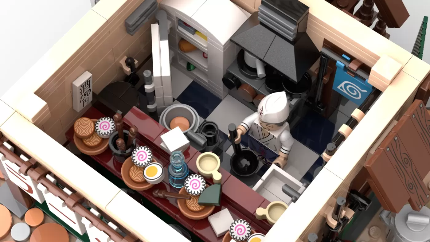 LEGO Ichiraku Ramen Shop interior overhead view with minifigure, counter, kitchen appliances, and detailed Japanese décor.